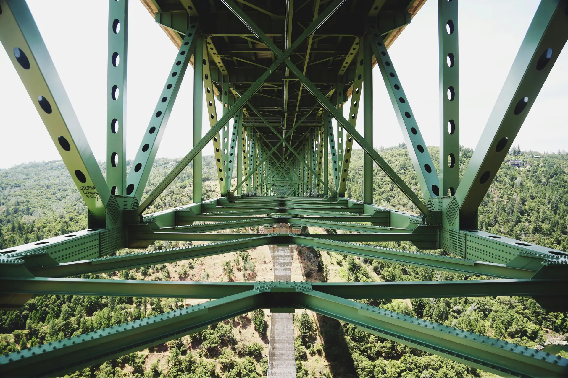 Looking through the steel trusses of Foresthill Bridge near Auburn, California